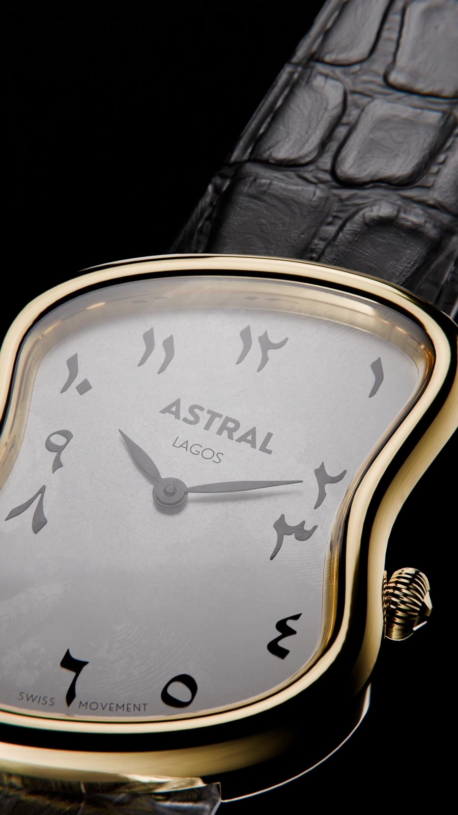 Close-up of the yellow gold case and white dial with Eastern Arabic numerals